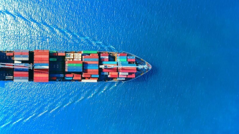 Aerial top view of a ship at sea