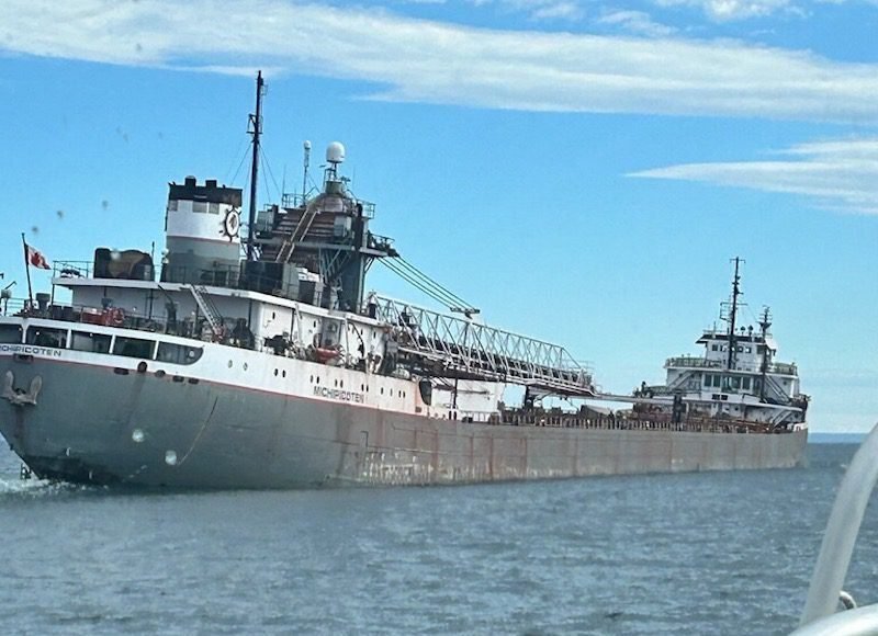 The 689-foot bulk carrier Michipicoten has safely anchored in Thunder Bay, Ontario, after combating flooding in Lake Superior. U.S. Coast Guard Photo