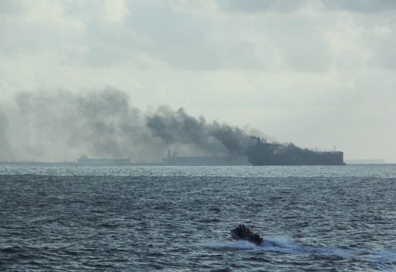 A handout image shows the RSS Supreme's rigid-hulled inflatable boat in the vicinity of the burning vessels following a fire on two oil tankers about 55 km (34 miles) northeast of the Singaporean island of Pedra Branca, July 19, 2024. Republic of Singapore Navy/Handout via REUTERS