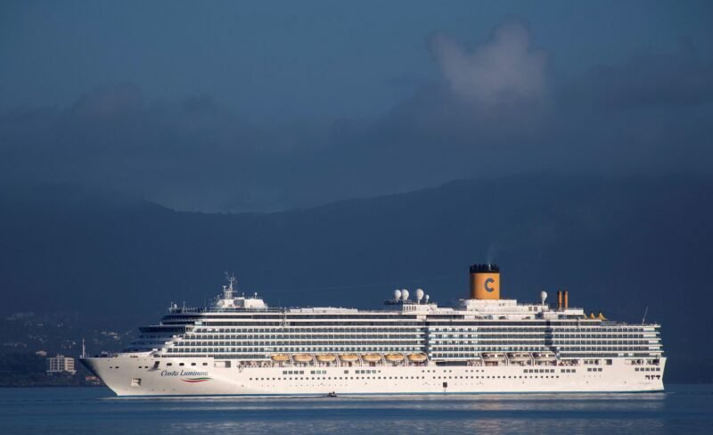 The Costa Luminosa cruise ship prepares to moor at the port of the island of Corfu. REUTERS/Adonis Skordilis