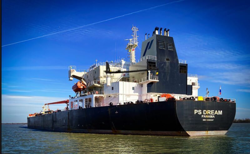 PS Dream chemical tanker at anchor under a clear blue sky
