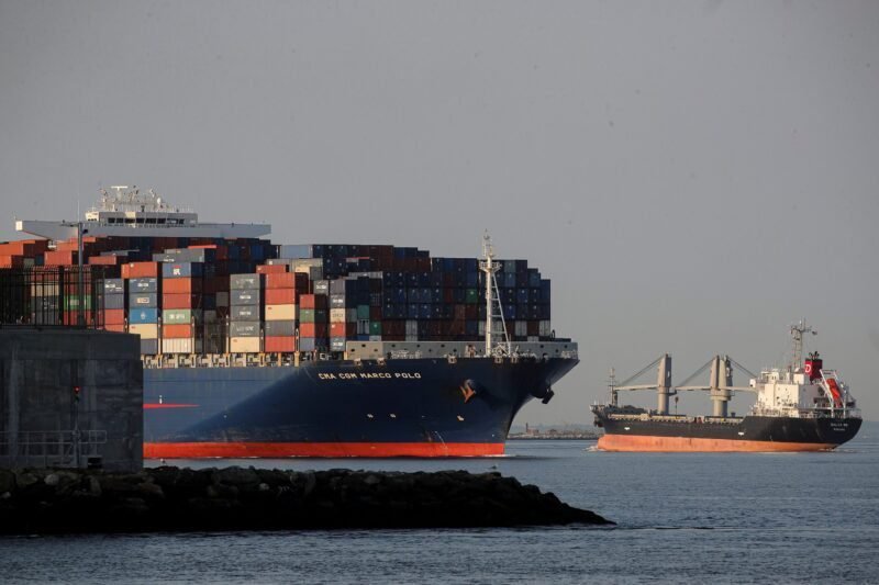 The CMA CGM Marco Polo, an Explorer class container ship crosses under the Verrazzano-Narrows Bridge, to enter New York Harbor as seen from Brooklyn, New York, U.S., May 20, 2021. REUTERS/Brendan McDermid/File Photo