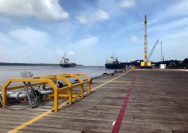 Vessels carrying supplies for an offshore oil platform operated by Exxon Mobil are seen at the Guyana Shore Base Inc wharf on the Demerara River, south of Georgetown, Guyana January 23, 2020. REUTERS/Luc Cohen/File Photo/File Photo