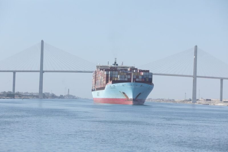 A Maersk containership is seen near Suez Canal Bridge which is known as the "Peace Bridge" in the Suez Canal, Egypt, August 6, 2023. Suez Canal Authority/Handout via REUTERS