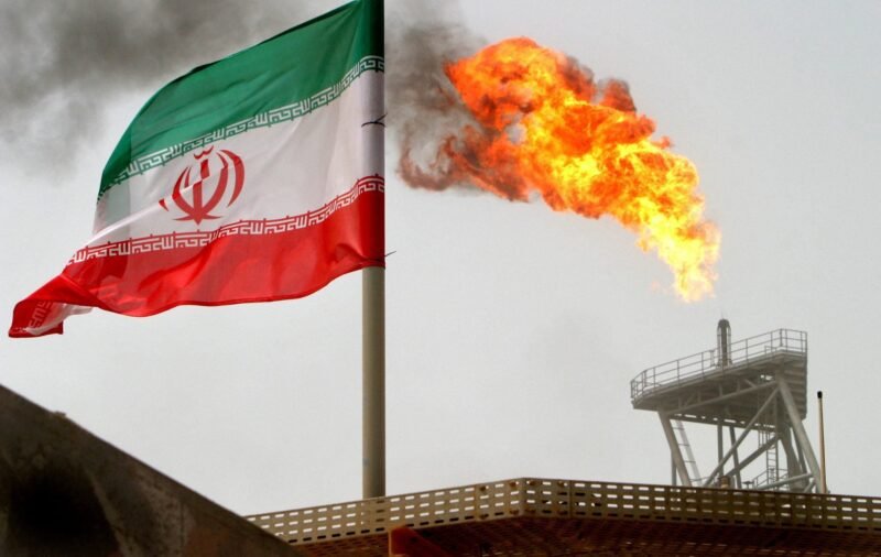 Iranian flag near oil refinery