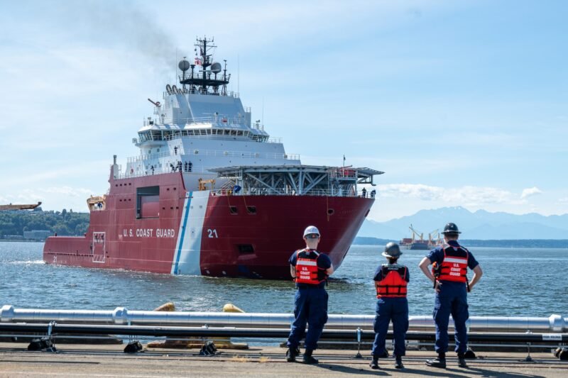 A linehandler aboard the U.S. Coast Guard Cutter Storis (WAGB 21) prepares to moor at Coast Guard Base Seattle, July 11, 2025