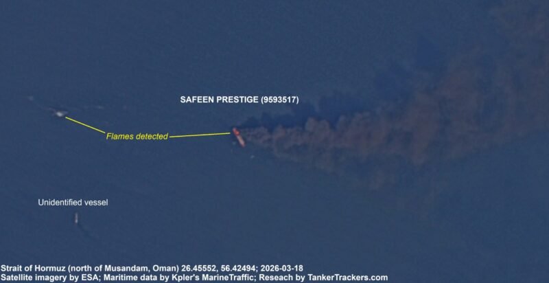 Satellite image of Safeen Prestige burning in the Strait of Hormuz after suspected second strike, with nearby unidentified vessel