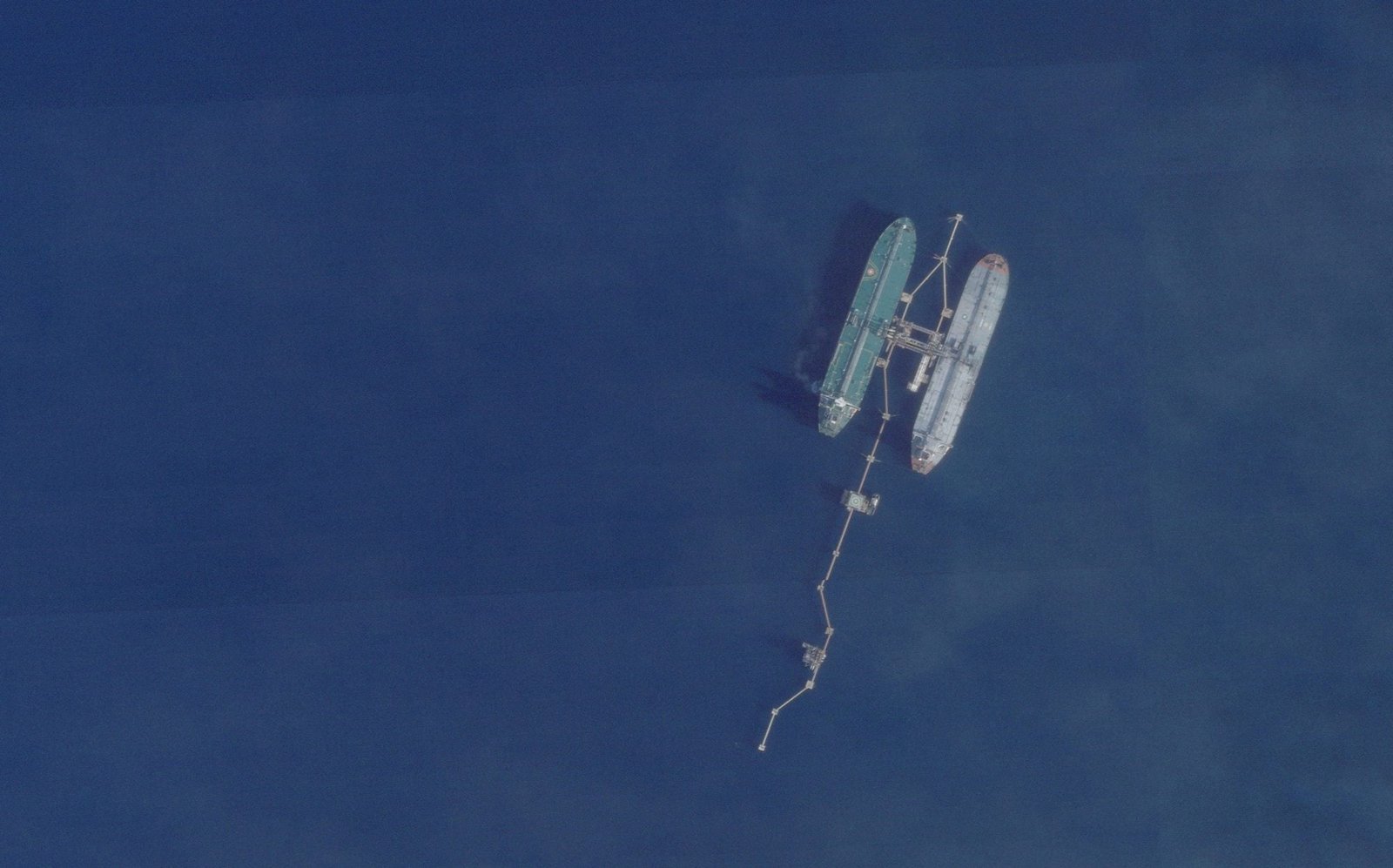 FILE PHOTO: A satellite image shows the very large crude carrier (VLCC) Skipper, which British maritime risk management group Vanguard said was believed to have been seized on December 10, as well as another vessel, off Port Jose, Venezuela, November 18, 2025