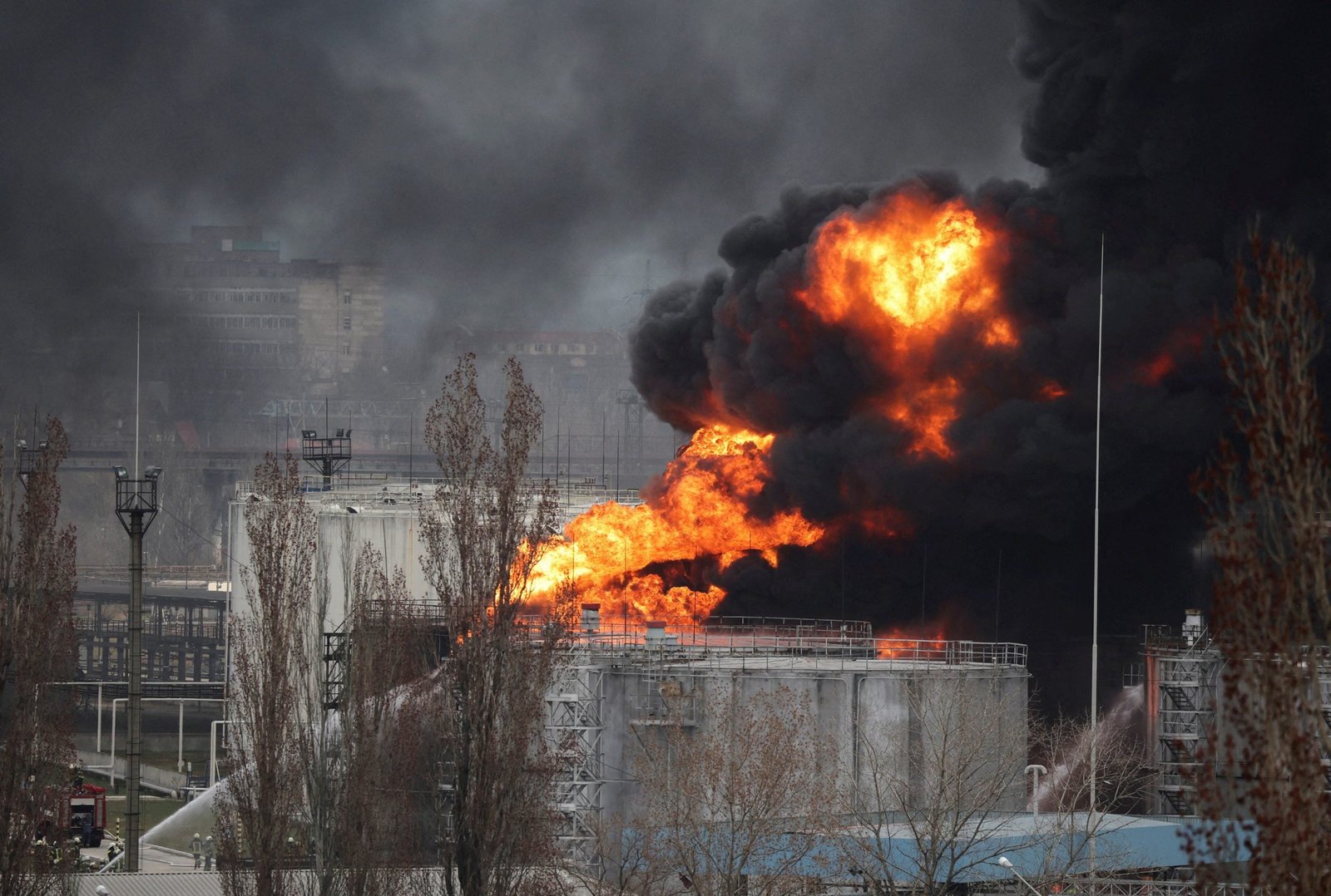 Firefighters operate at an oil refinery which caught fire following a missile attack near the port city of Odesa, amid the ongoing Russia's invasion, in Ukraine, April 3, 2022. REUTERS/Nacho Doce,