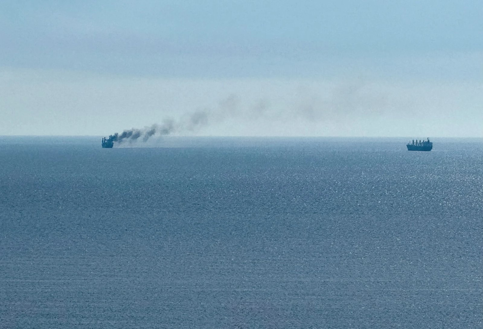 A civilian vessel is on fire, as Ukraine's navy spokesman reported a Russian military strike on a civilian vessel, amid Russia's attack on Ukraine, near the Black Sea port of Odesa