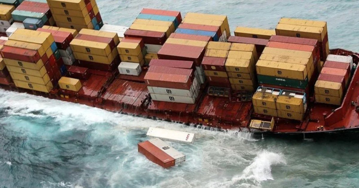 Container ship with collapsed stacks and containers lost overboard