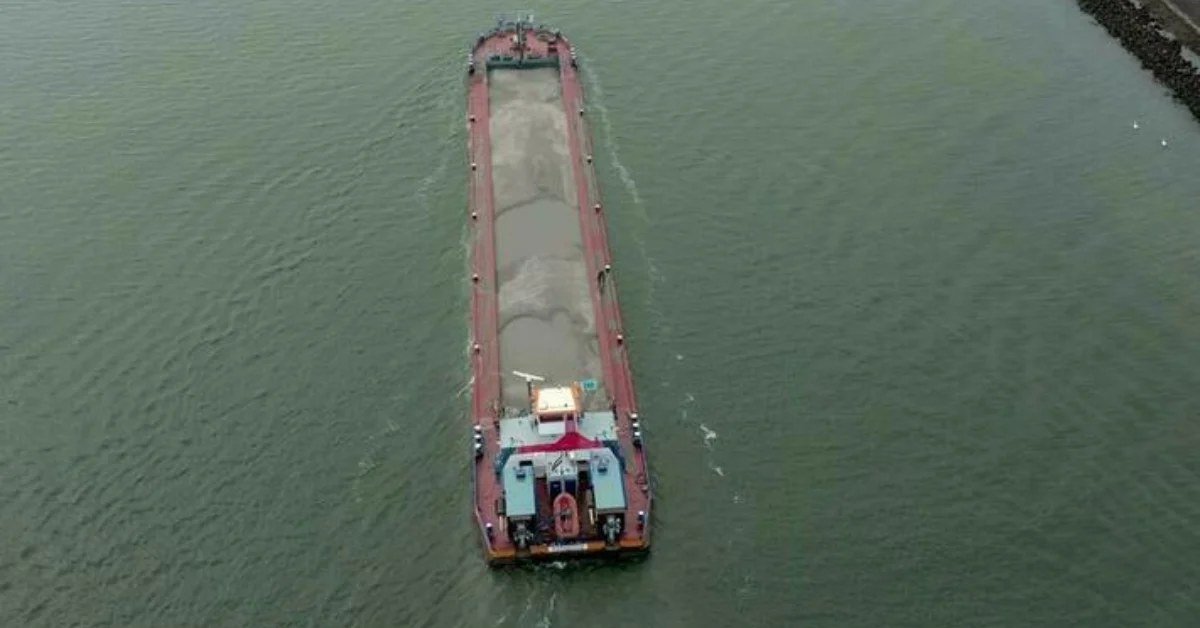 Aerial view of a cargo barge on an Indian inland waterway