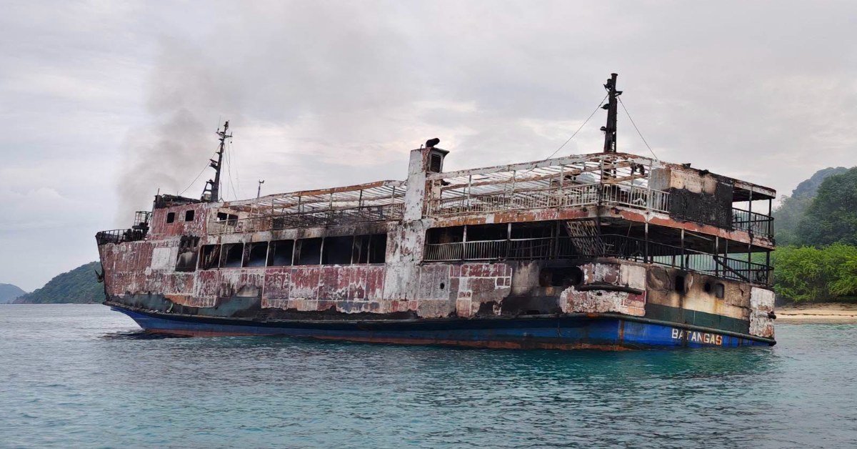 Burned-out hull of the ferry MV June Aster after the fire off Palawan
