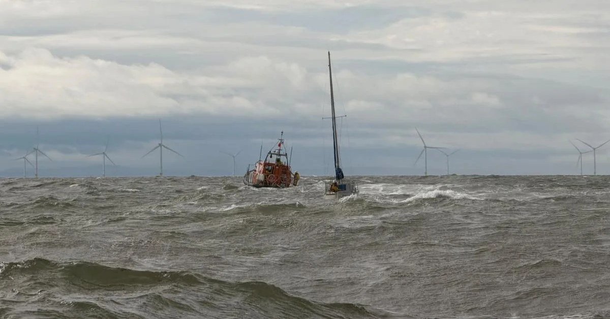Sailing yacht in rough seas during a rescue operation